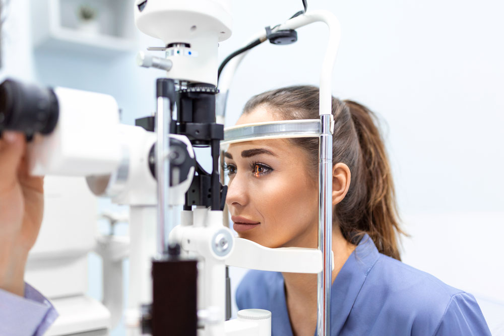 Woman receiving an eye exam for LASIK