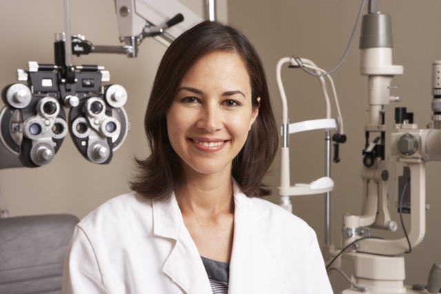 Portrait Of Female Optician In Surgery