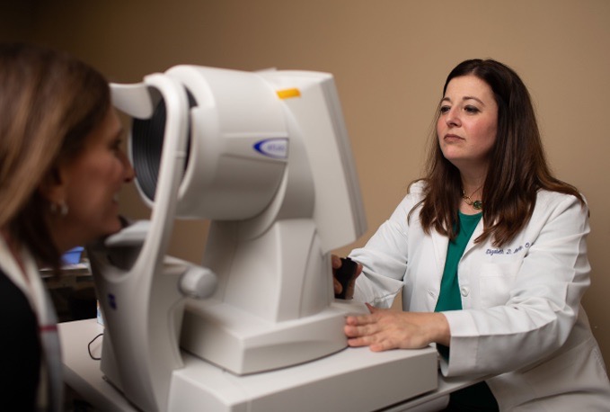 Eye doctor checking a patient